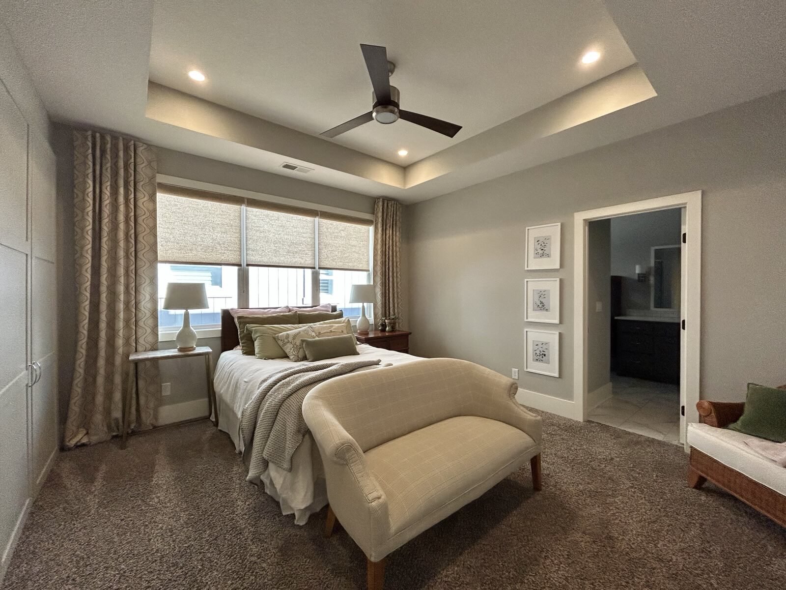 Primary bedroom with ensuite bathroom and separate his and her closets - 405 E 32nd Ave