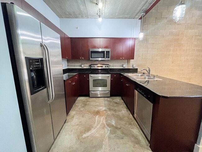 Building Photo - Lofts Oasis #117