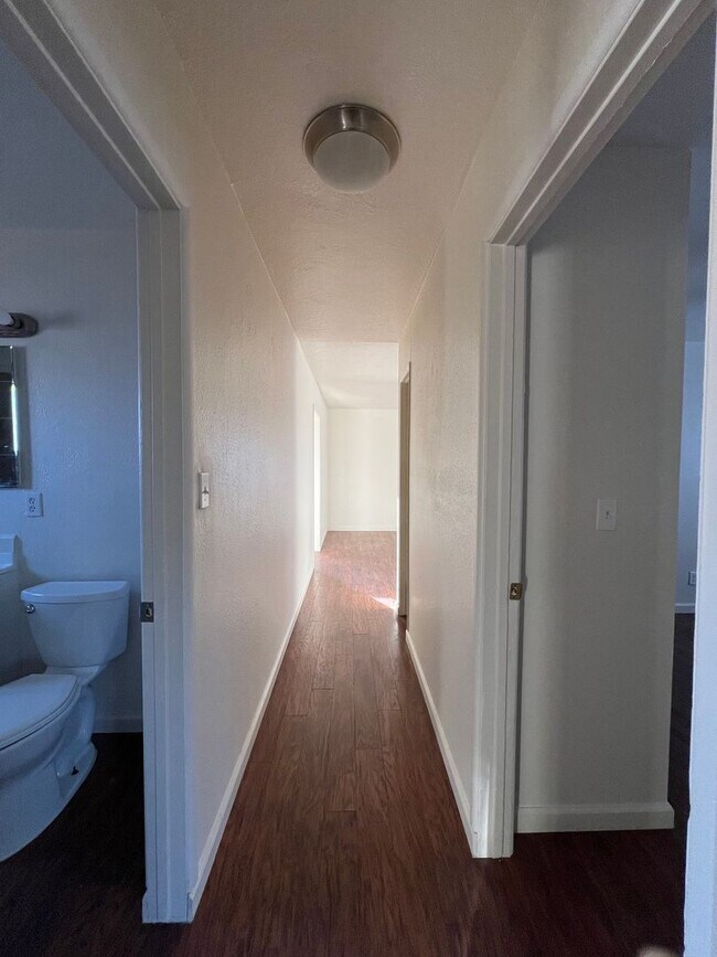 Building Photo - 3 Bedroom 1 Bathroom House with Huge Fenced Yard Near Schools, Park & Community Pool