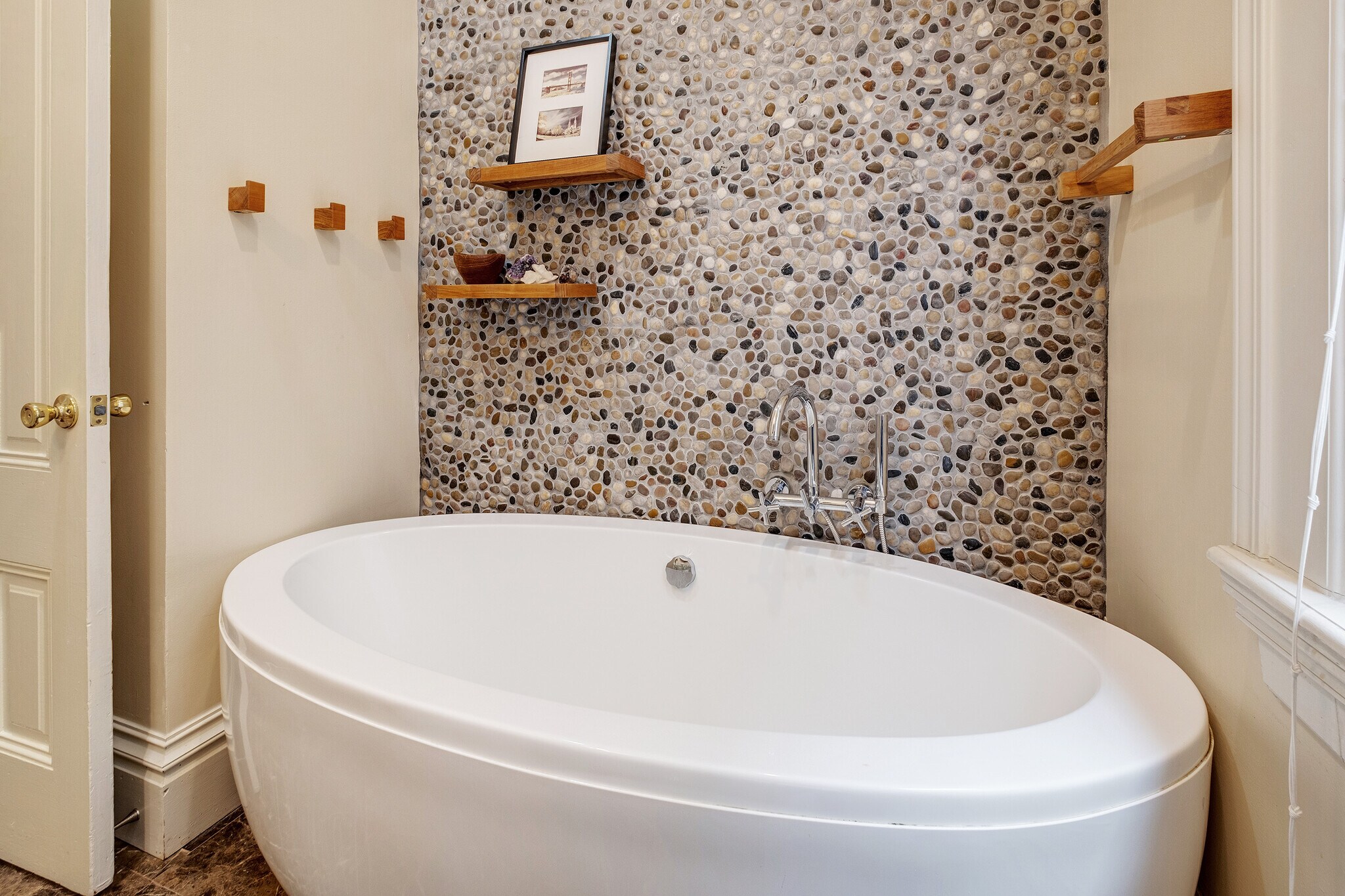 Upstairs Bathroom with standalone tub and pebble wall - 2188 Sutter St