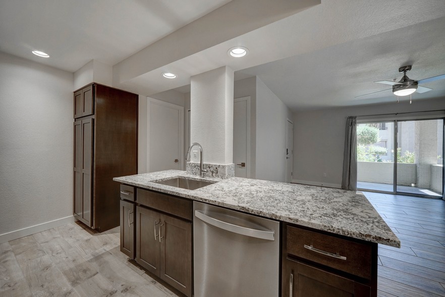 Kitchen pantry and Island with open view - 10610 S 48th St