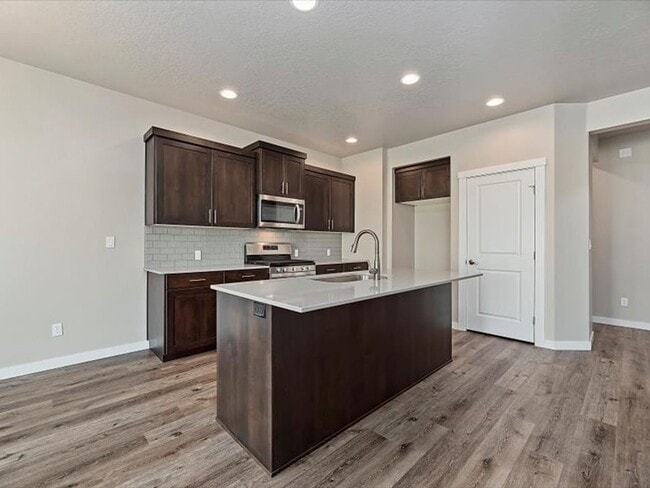 Building Photo - Must See!  Ready to move in! 4 bedroom, 2 bath home available in Verado with landscaping Included!