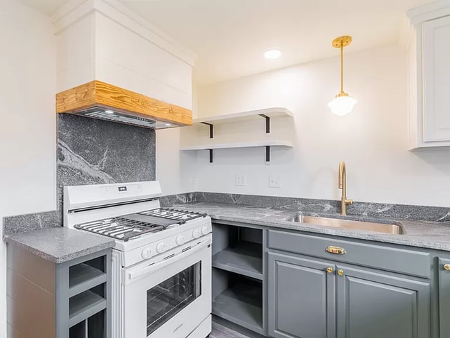 Building Photo - Beautifully Restored Belmont Gem With Fenced Yard