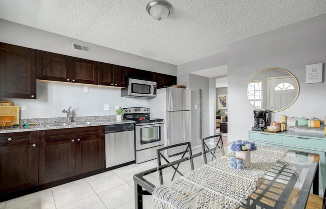 Building Photo - 9440 E Girard Ave