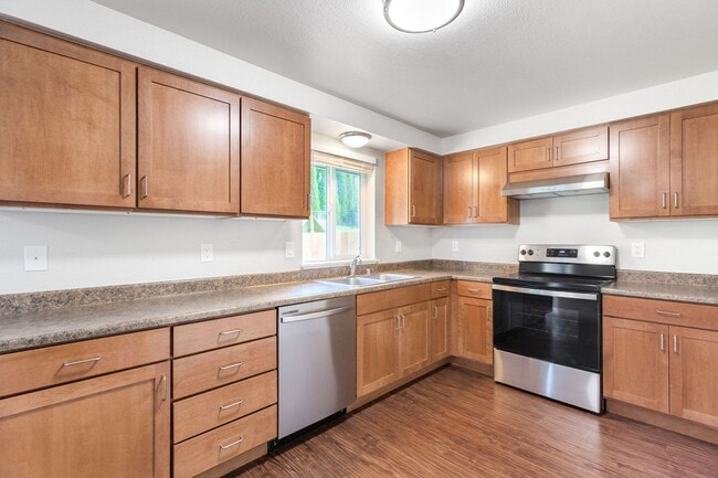 Building Photo - Recently updated 3 bdrm, 2 bath. Attached garage. Wrap around yard. Private upstairs bedroom and ...