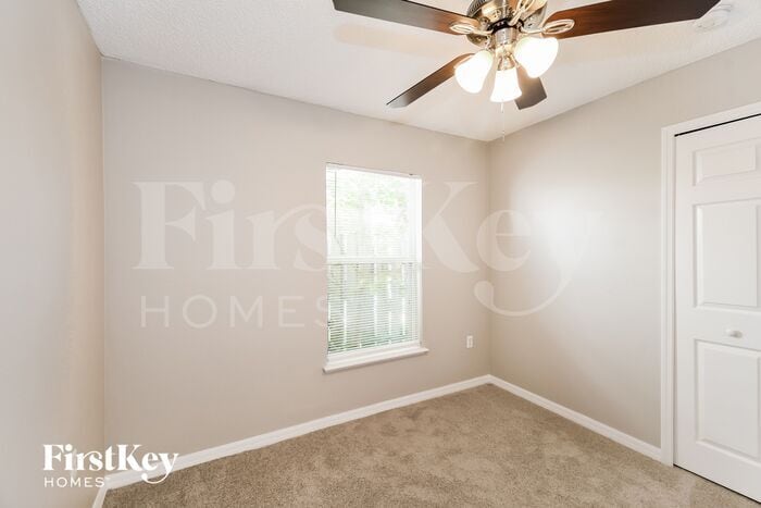 Building Photo - 6565 Gentle Oaks Dr