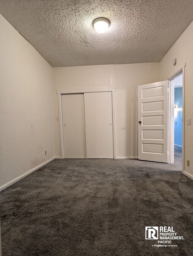 Building Photo - Charming 2BR Home with Private Deck & Shared Backyard – Oakland