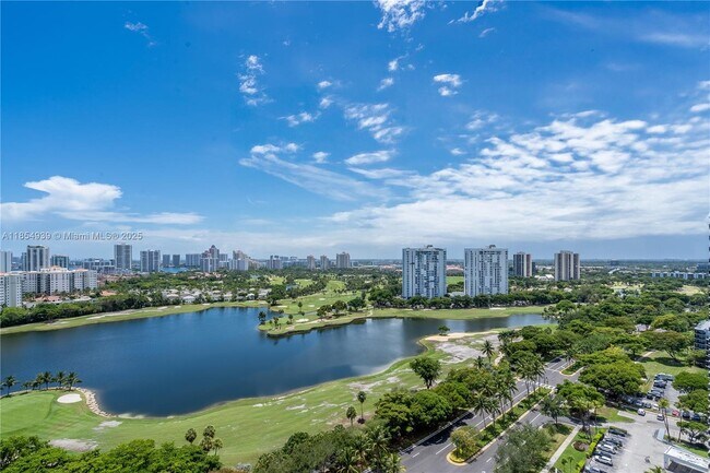 Building Photo - 3675 N Country Club Dr