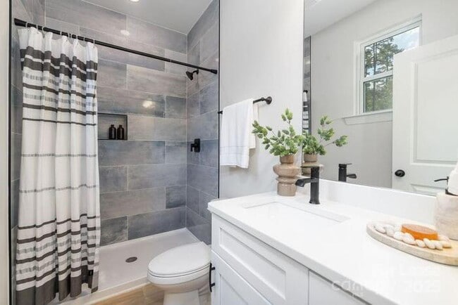 Building Photo - Brand new single family home with fenced yard!