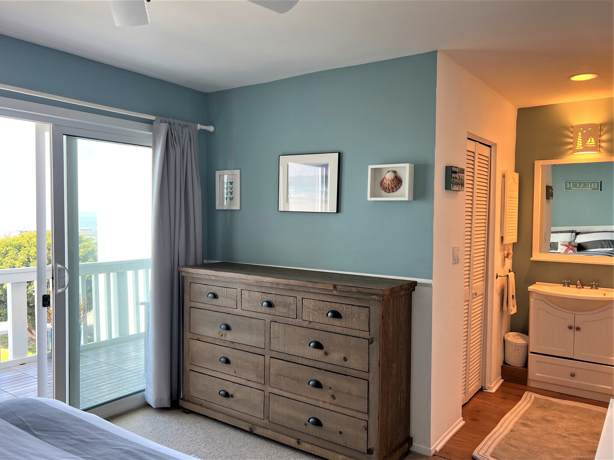 Bedroom 1 with adjacent vanity and walk in - 665 The Village