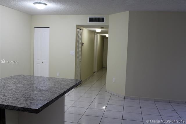 Building Photo - 4680 NW 102nd Ave  104-20