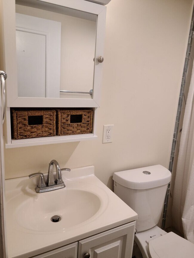 Building Photo - Off Street Parking - Short distance to T stop and Whole Foods - Updated kitchen and bathroom