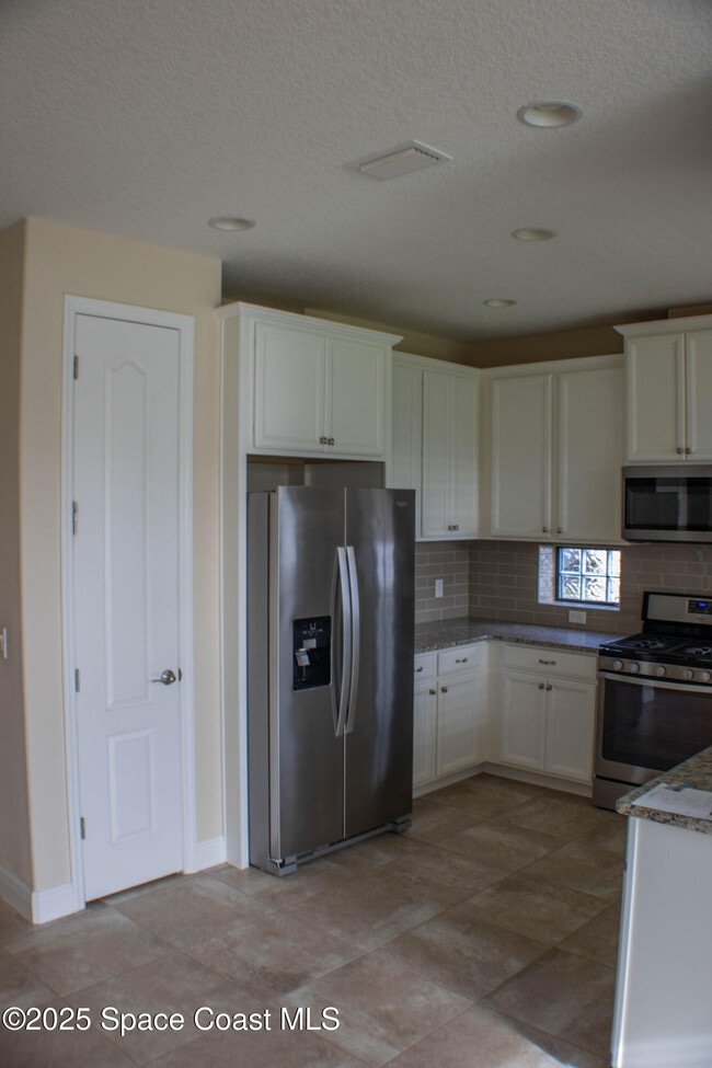 Building Photo - 7518 Bluemink Ln