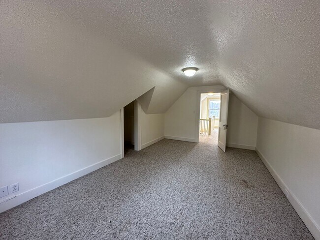 Building Photo - House in Bedford with Lot of Outdoor Space.