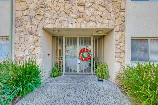 Gated entry - Secure, Courtyard-Style Apartments in Park Mesa Heights — Classic Charm, Modern Convenience
