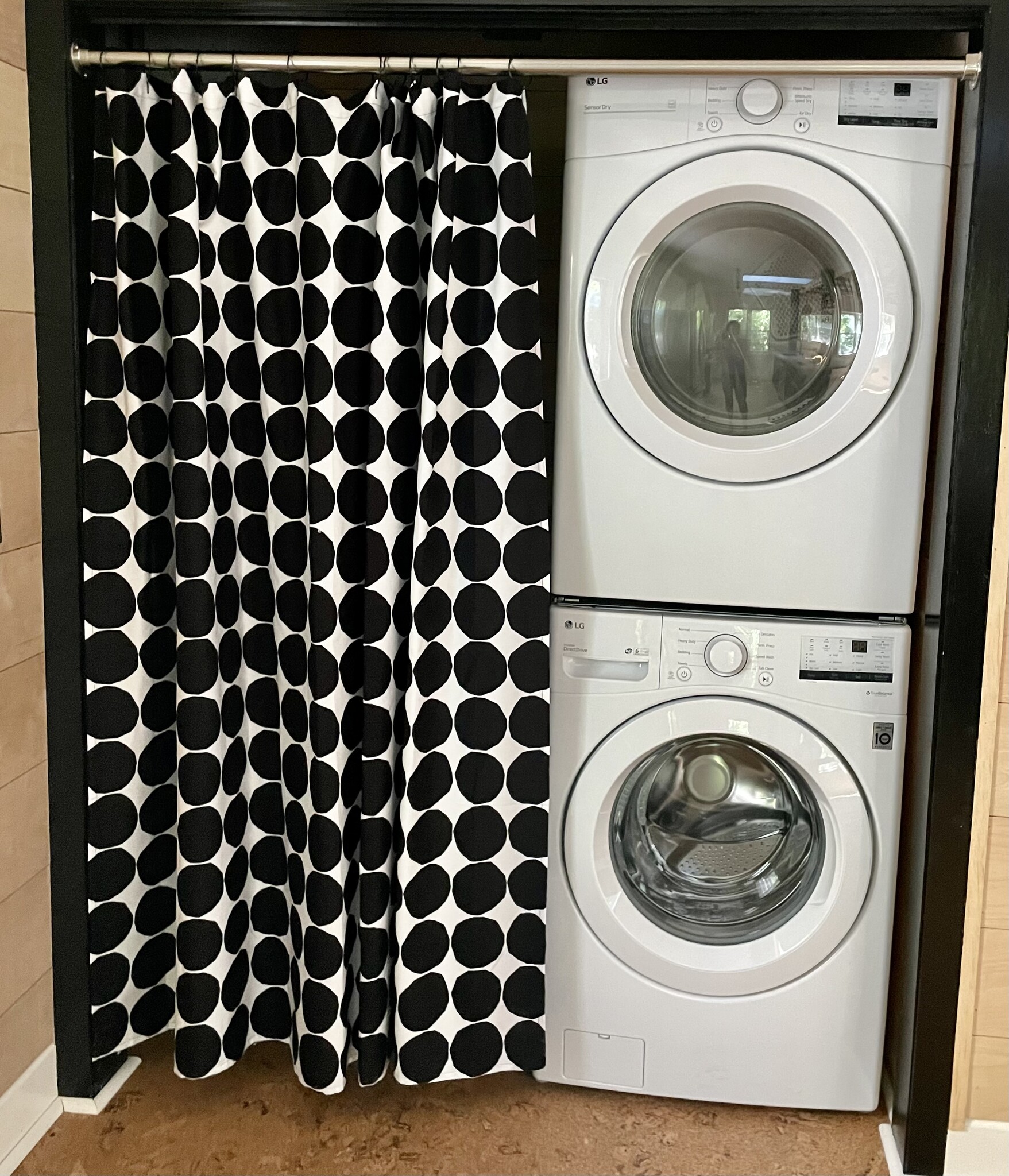 Brand new LG washer/dryer set-up with shelving and designer curtain to hide from guests. - 6605 Shady Lake Ln