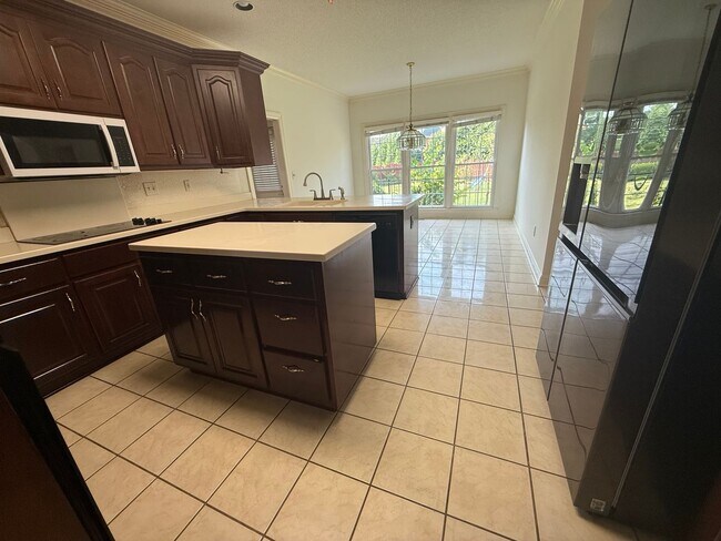 Building Photo - Spacious 5-Bedroom Home on a Corner Lot in...