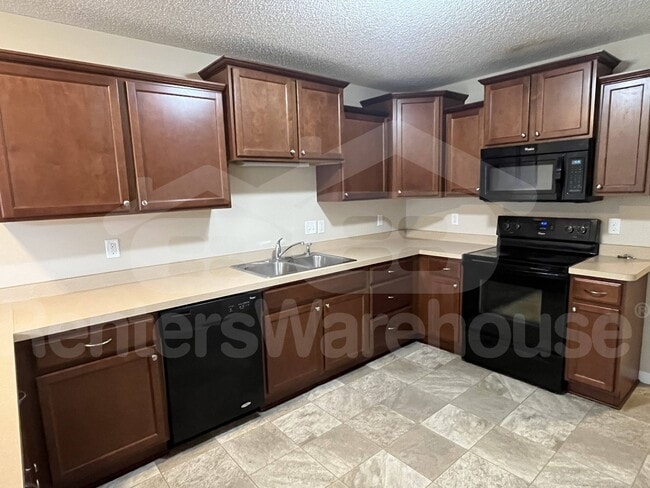 Building Photo - 6953 99th Ct S
