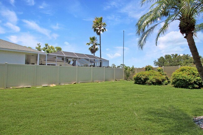 Building Photo - Annual rental: Spacious 3BR/2BA Creekwood Home with Office, Screened Lanai, EV Charger & Resort-S...