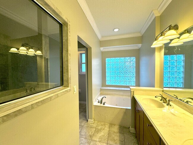 Building Photo - Coastal Charm: Luxurious 4-Bedroom Home in Gated Community Near the Intracoastal