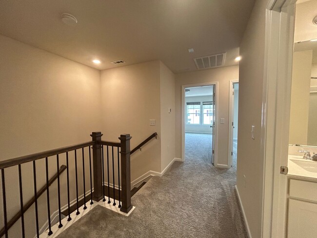 Building Photo - Stunning end-unit newly built 3 bedroom 2....