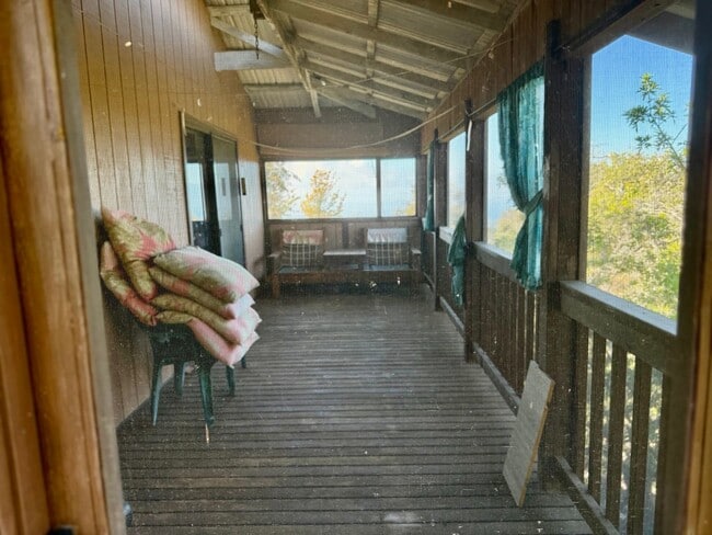 Building Photo - Experience comfort in this charming 3 bed, 2 bath rental home with a wood-burning stove, sunken j...