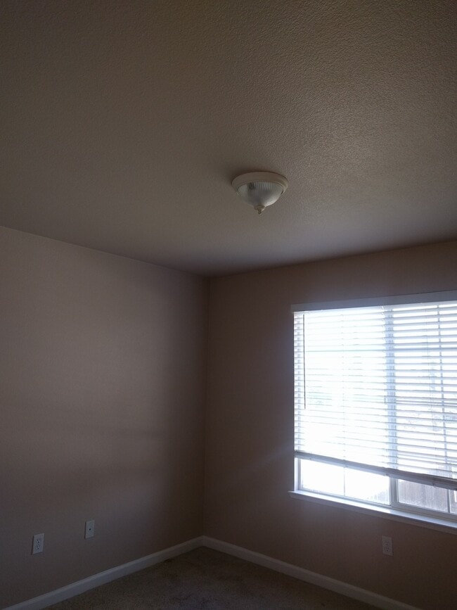 Building Photo - Gated Community Stunner ready to be called home