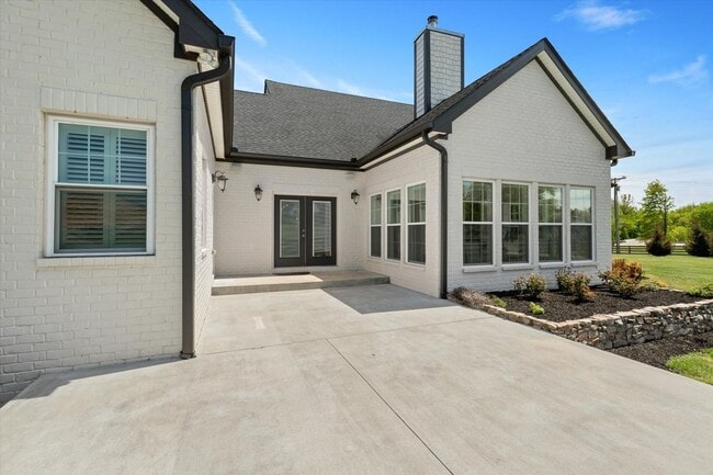 Building Photo - unning custom-built home on a full acre in...