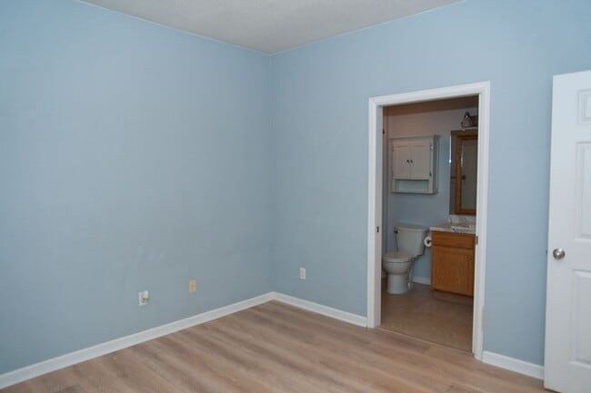 Building Photo - Updated and Bright 2B/2B with Attached Garage Now Available!