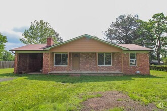 Building Photo - Welcome to this charming 3-bedroom, 2-bath...