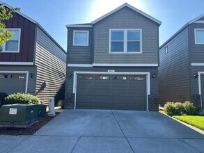 Building Photo - Recently Renovated! Spacious 3 Bedroom Home with Fenced Yard, Patio, and 2-Car Garage With Move I...