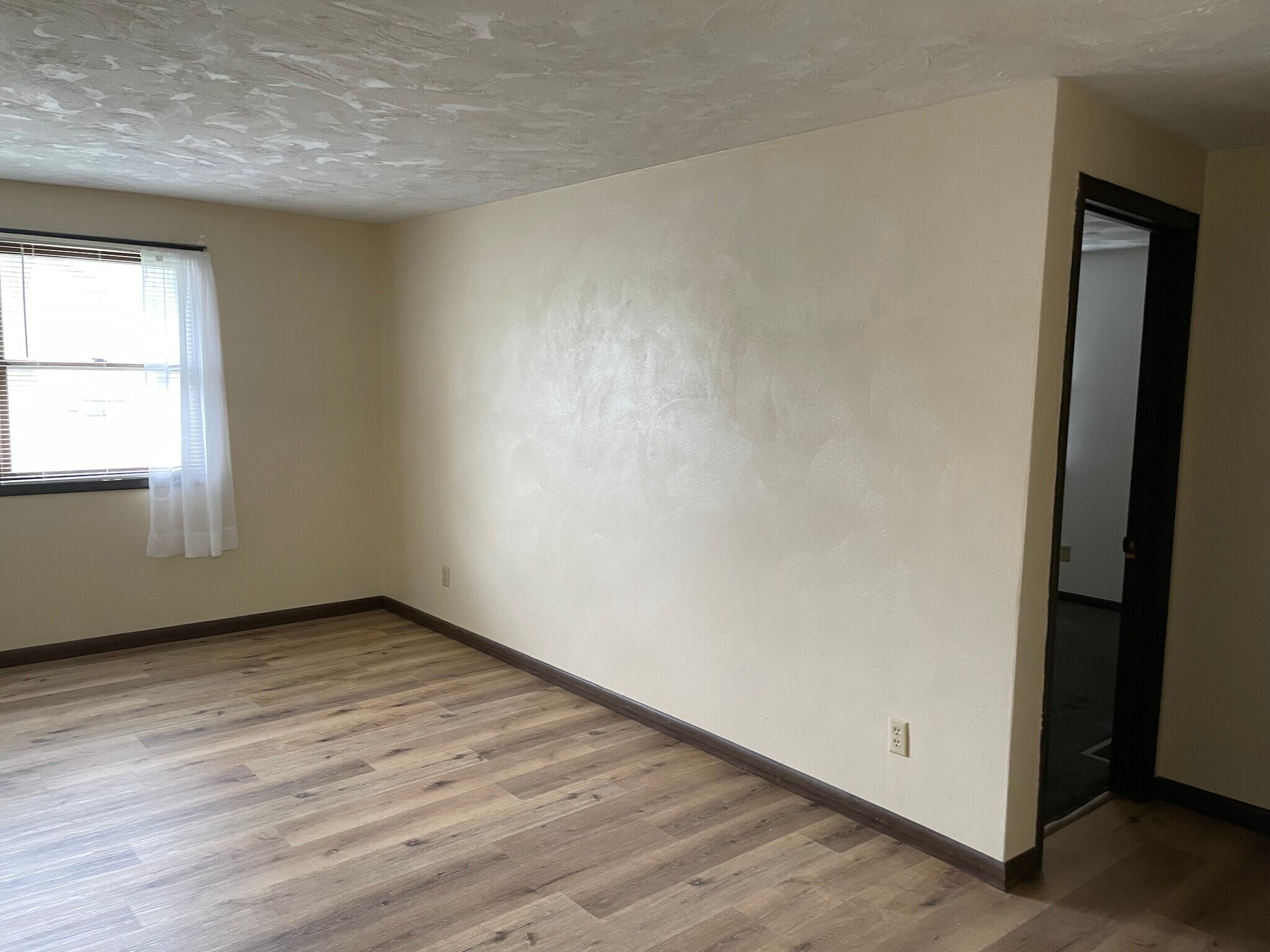 living room Grass Roots Properties LLC - 115 S Clinton St
