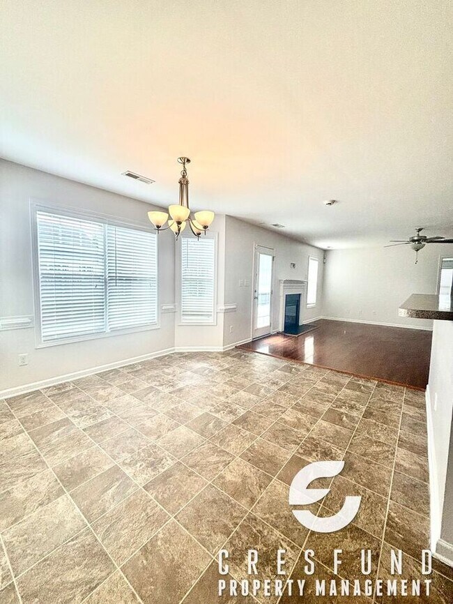Building Photo - Freshly Painted and Spacious 4 Bedroom, 3 ...