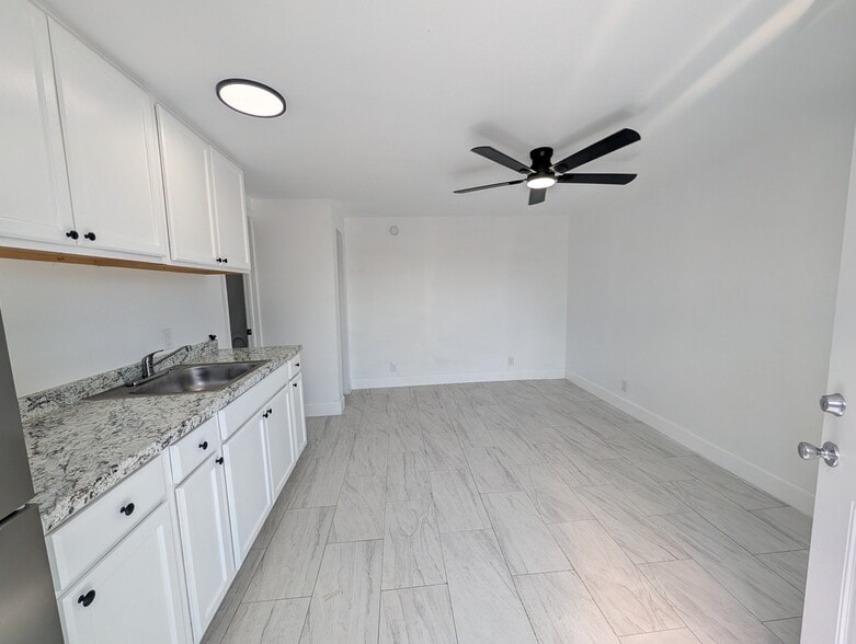 Building Photo - 1909 E 99th Ave