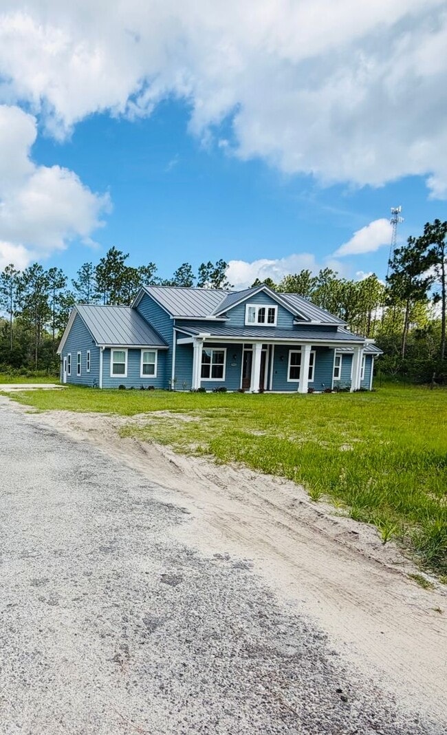 Building Photo - Gated 10-Acre Luxury Retreat with 40x60 Climate-Controlled Shop & Barn!