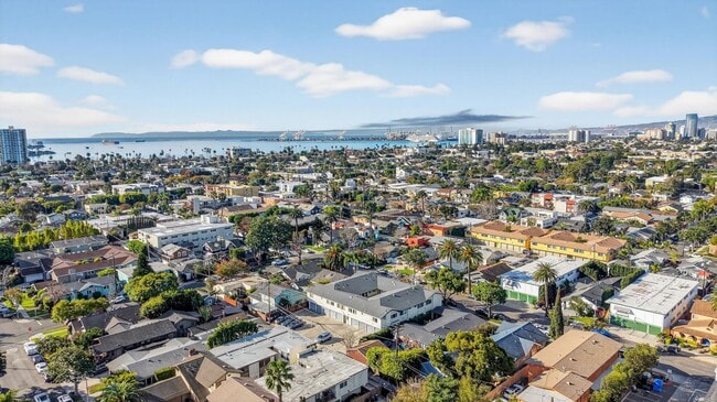 Building Photo - Gorgeous 2 Bedroom inside Gated Community! Close to Beach