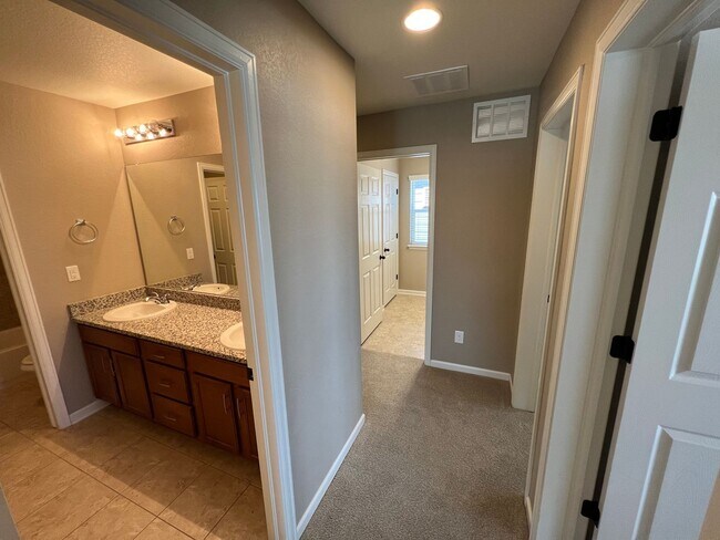 Building Photo - Spacious Corner-Lot Gem in South Denver Metro