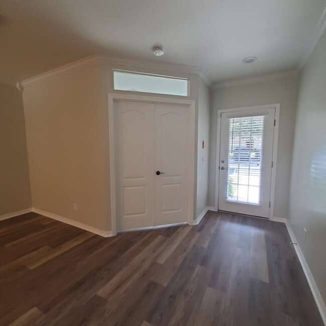 Double doors to lower level bedroom - 5808 Fishhawk Ridge Dr