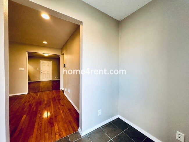 Building Photo - Adorable Home Featuring Wood Floors, SS Ap...