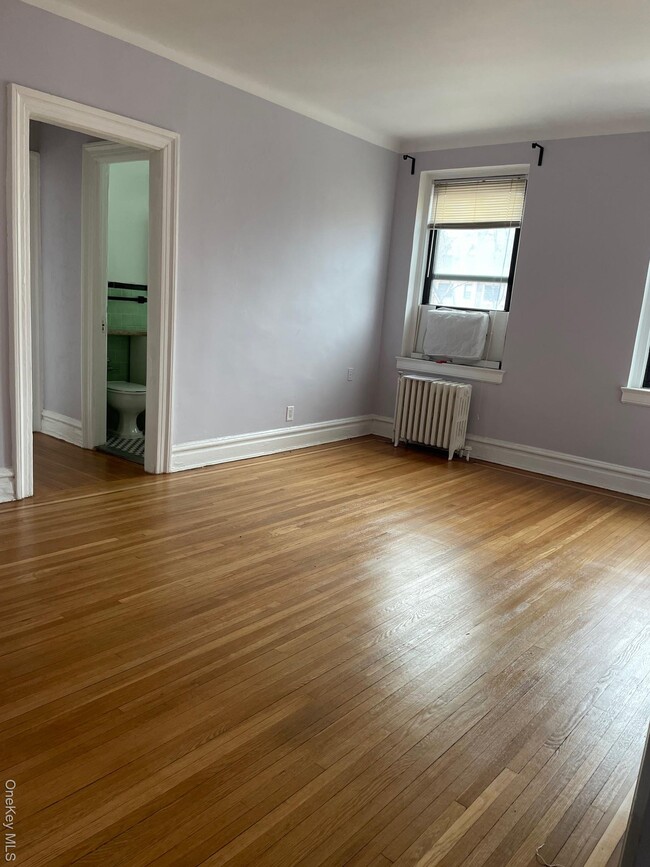 Building Photo - 77-20 Austin St