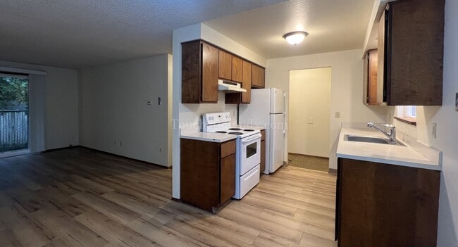 Building Photo - Updated 2 Bedroom Featuring New Plank Flooring