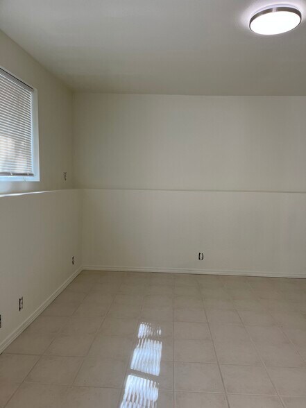 Office. Main floor off dining room. - 2143 SE Douglas Ave