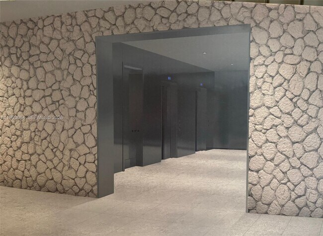 Building Photo - 5555 Collins Ave