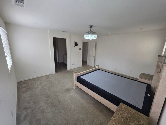 Building Photo - Spacious 5BR + Loft in Hamptons Village – Studio Suite, New HVAC, EV Charging