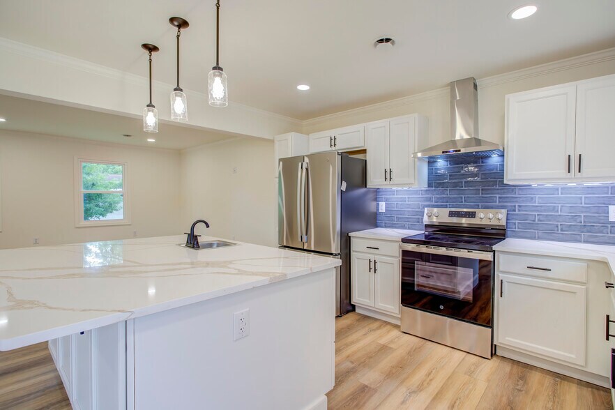 New Stainless steel appliances, hood, and open floor plan - 288 Beaver Rd