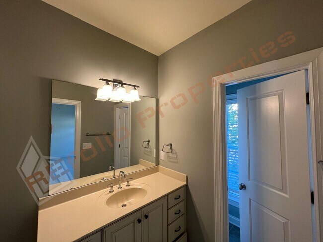 Building Photo - Elegant 3 Story 3 Bedroom Formal Model Tow...