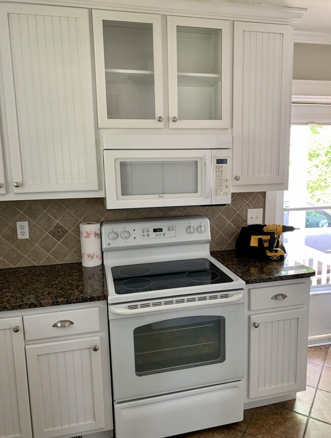 Kitchen and covered side door to driveway - 1112 Joyner Ave