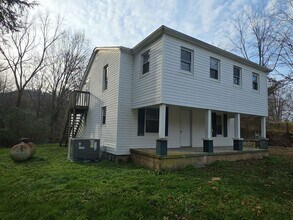 Building Photo - Remodeled 5-Bedroom Farmhouse with Modern Updates and Peaceful Country Setting in Sparta