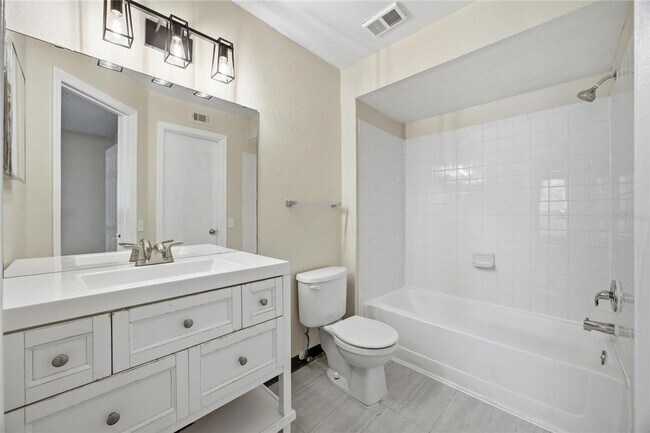 Building Photo - Location! Beautifully located condo just minutes from Orlando International Airport,