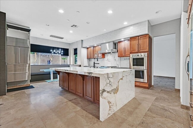 Building Photo - Fully Upgraded 5 Bedroom 4.5 Bathroom in Guard Gated Foothills Community!